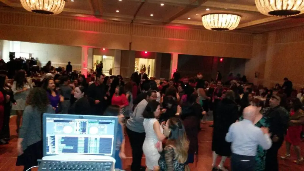 Corporate Event Christmas Party - Mr DJ Services Our Event Dj Services for a 300 plus dance in a ballroom with chandeliers. A DJ, lighting and corporate games.