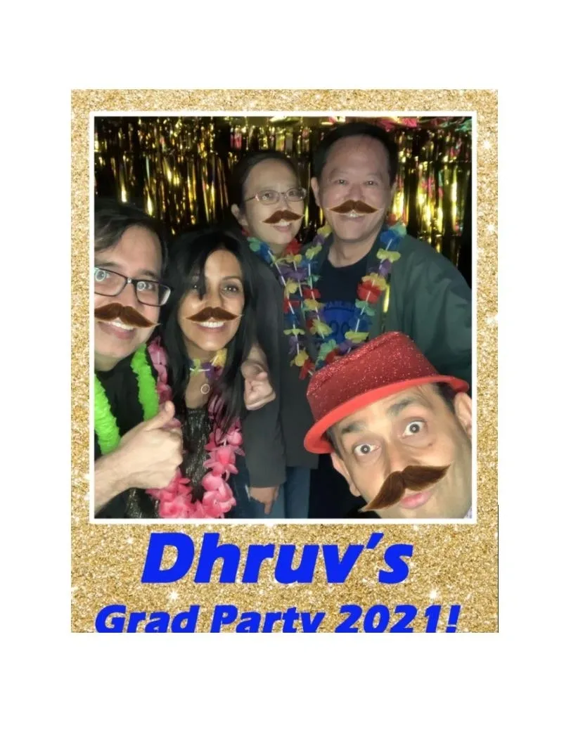 Mr Dj Services and Five guests using the digital prop mustache and festive accessories pose together at our photo booth.